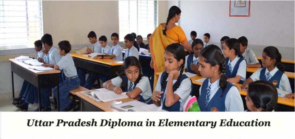A classroom scene where students in blue uniforms are sitting at desks and studying, while a teacher in a yellow saree is guiding them. The text 'Uttar Pradesh Diploma in Elementary Education' is displayed at the bottom